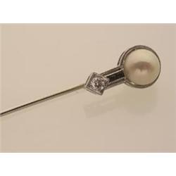 art deco stickpin In 14K white gold, a 7.3 mm. half pearl leads to to French cut blue sapphires t...