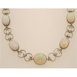 vintage opal, diamond and gold necklace In 18K rhodium plated gold, the handmade necklace is comp...