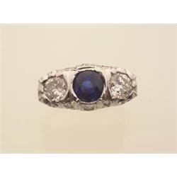 Platinum, sapphire and diamond ring In platinum; the antique-style pierced engraved and diamond a...