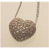 Image 1 : heart shape pendant with pave set diamonds A puffed heart shape pendant is pave set with sixty...