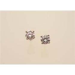 diamond solitaire earrings, .49 carat The 14K white gold four claw settings for pierced ears cont...