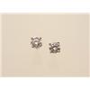 Image 1 : diamond solitaire earrings, .49 carat The 14K white gold four claw settings for pierced ears cont...
