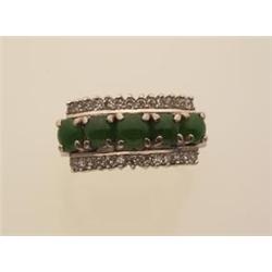 vintage jade and diamond ring In 18K white gold, designed as a row of five round jade cabochons,...