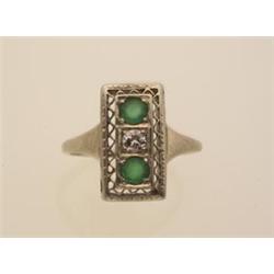 vintage emerald and diamond ring In 14K white gold, the rectangular top is set with two round eme...