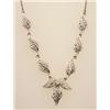 Image 1 : gold and diamond lavaliere In 14K white gold, a navette shape diamond set clasp suspends lengths...