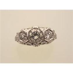 antique style diamond ring The platinum pierced, millegrained ring is set with a round European c...