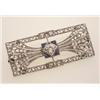 Image 1 : vintage diamond and sapphire brooch The rectangular shape platinum frame contains a stylized bow...