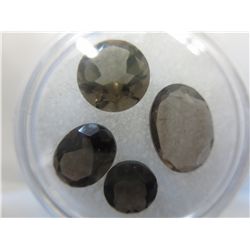 Four loose Brown Topaz gemstones