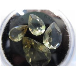 Four loose various cut Citrine gemstones