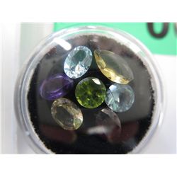 Assorted loose cut gemstones