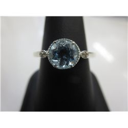 Blue topaz solitaire ring with Diamond shoulders