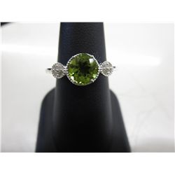 Peridot cocktail ring  - set with 8 Diamonds.