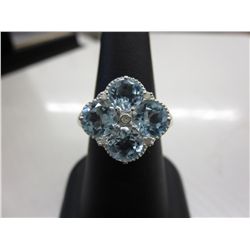 Blue Topaz & Diamond cocktail ring in .925 Silver