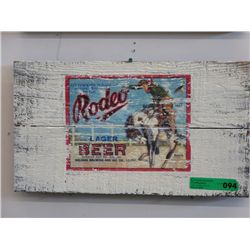 Folk art painted Rodeo Lager sign