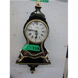 Wall hanging clock, battery operated
