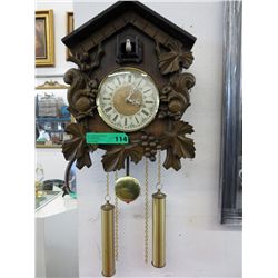 Carved pendulum cuckoo clock