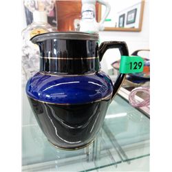 Hand painted porcelain jug