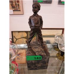 Skier. 12" tall, 4" x 4" at the base