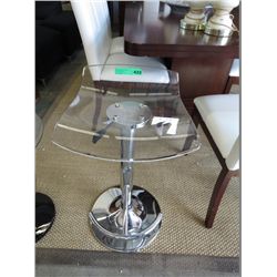Hydraulic bar stool with clear Plexiglas seat.