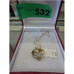 Gold heart necklace with Diamonds
