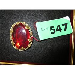 Vintage brooch with red stone