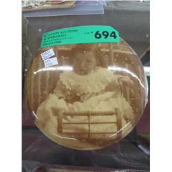 1930's photo on tin, 6" dia.