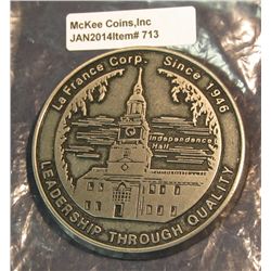 713. Large Pewter Medal. "LaFrance Corp. Since 1946 Leadership Through Quality". Paper weight. Weigh