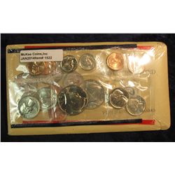 1522. 1972 & 1990 U.S. Mint sets in original U.S. Mint issued envelopes and cellophanes.