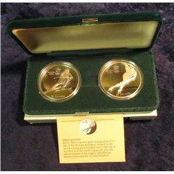 1584. Pair of 1985 dated 1988 Calgary Olympics Proof $20 Canada One Ounce Silver Coins in original R