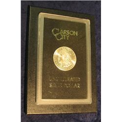 1600. 1884 CC Morgan Silver Dollar in original black box of issue with official card. MS 62/63.