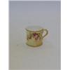 Image 1 : A ROYAL WORCESTER MINIATURE MUG, blush ivory, rose decorated, date cypher 1903, height 4cm  30-50...