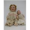 Image 1 : A CONTINENTAL DOLL, bisque head, impressed 'Germany II', flaxen horsehair wig, blue sleeping glas...
