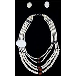 Ivory Necklace & Earrings The lot features an orig