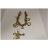 Image 1 : ONE 10KT YELLOW GOLD CHARM BRACELET. MADE IN A CONTEMPORARY DESIGN, INCLUDES 11 CHARMS 10KT AND