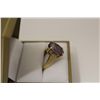 Image 2 : ONE LADIES 10KT YELLOW GOLD NATURAL AMETHYST RING. SET WITH 1 OVAL MIXED CUT NATURAL AMETHYST 7.45