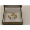 Image 1 : ONE 10KT YELLOW GOLD AND RHODIUM FINISH DIAMOND SET WEDDING OR ANNIVERSARY RING. SET WITH 5 SINGLE