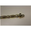 Image 3 : ONE 14KT YELLOW GOLD AND WHITE GOLD DIAMOND LINE DESIGN BRACELET. THE BRACELET IS CHANNEL SET WITH