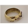 Image 2 : ONE 10KT YELLOW GOLD CUSTOM AND HAND MADE COLOURED GEMSTONE BANGLE STYLE BRACELET. 24MM WIDE AND