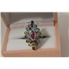 Image 1 : ONE LADIES STERLING SILVER COLOURED GEMSTONE SET COCKTAIL STYLE RING. THE RING IS BEZEL SET WITH A