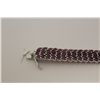 Image 2 : ONE STERLING SILVER NATURAL RUBY BRACELET. THE BRACELET IS CLAW SET WITH A TOTAL OF 188 MARQUISE