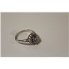 Image 1 : ONE LADIES 14KT WHITE GOLD NATURAL TANZANITE AND DIAMOND SET DRESS RING. SET WITH 1 OVAL MIXED CUT