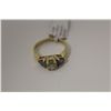 Image 1 : ONE LADIES 14KT YELLOW GOLD DIAMONDS AND NATURAL TANZANITE DRESS RING. SET WITH 1 ROUND BRILLIANT