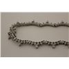 Image 2 : ONE 14KT WHITE GOLD DIAMOND SET CHOKER LENGTH NECKLACE. THE NECKLACE IS THREE CLAW SET WITH A TOTAL