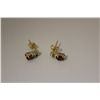Image 1 : ONE PAIR OF 14KT YELLOW GOLD RUBY AND DIAMOND SET EARRINGS. THE PAIR IS SET WITH 6 TAPERED BAGUETTE