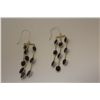 Image 1 : ONE PAIR OF 14KT YELLOW GOLD DANGLING NATURAL BLUE SAPPHIRE EARRINGS. SET WITH 18 OVAL MIXED CUT