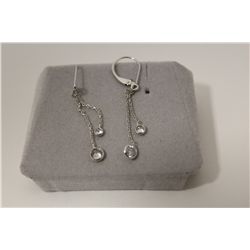 ONE PAIR OF 14KT WHITE GOLD DIAMOND SET DANGLING EARRINGS. THE EARRINGS ARE SET WITH 2 ROUND