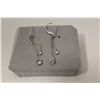 Image 1 : ONE PAIR OF 14KT WHITE GOLD DIAMOND SET DANGLING EARRINGS. THE EARRINGS ARE SET WITH 2 ROUND