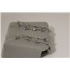 Image 2 : ONE PAIR OF 14KT WHITE GOLD TOPAZ AND TANZANITE DANGLING EARRINGS. SET WITH 6 ROUND BRILLIANT CUT