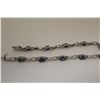 Image 2 : ONE 10KT WHITE GOLD NATURAL BLUE SAPPHIRE AND DIAMOND SET BRACELET. SET WITH 10 OVAL MIXED CUT