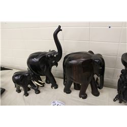 3 HAND CARVED EBONY ELEPHANT WITH TRUNK EXTENDED, 18" TALL (TO TOP OF TRUNK) IVORY INLAID INTO FEET